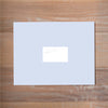 Elegant Script mailing label shown in Plum on Bluebell presentation envelope 