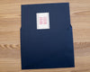 Night pocket folder sliding in envelope