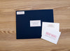 Simply Preppy personal note card next to Night presentation envelope